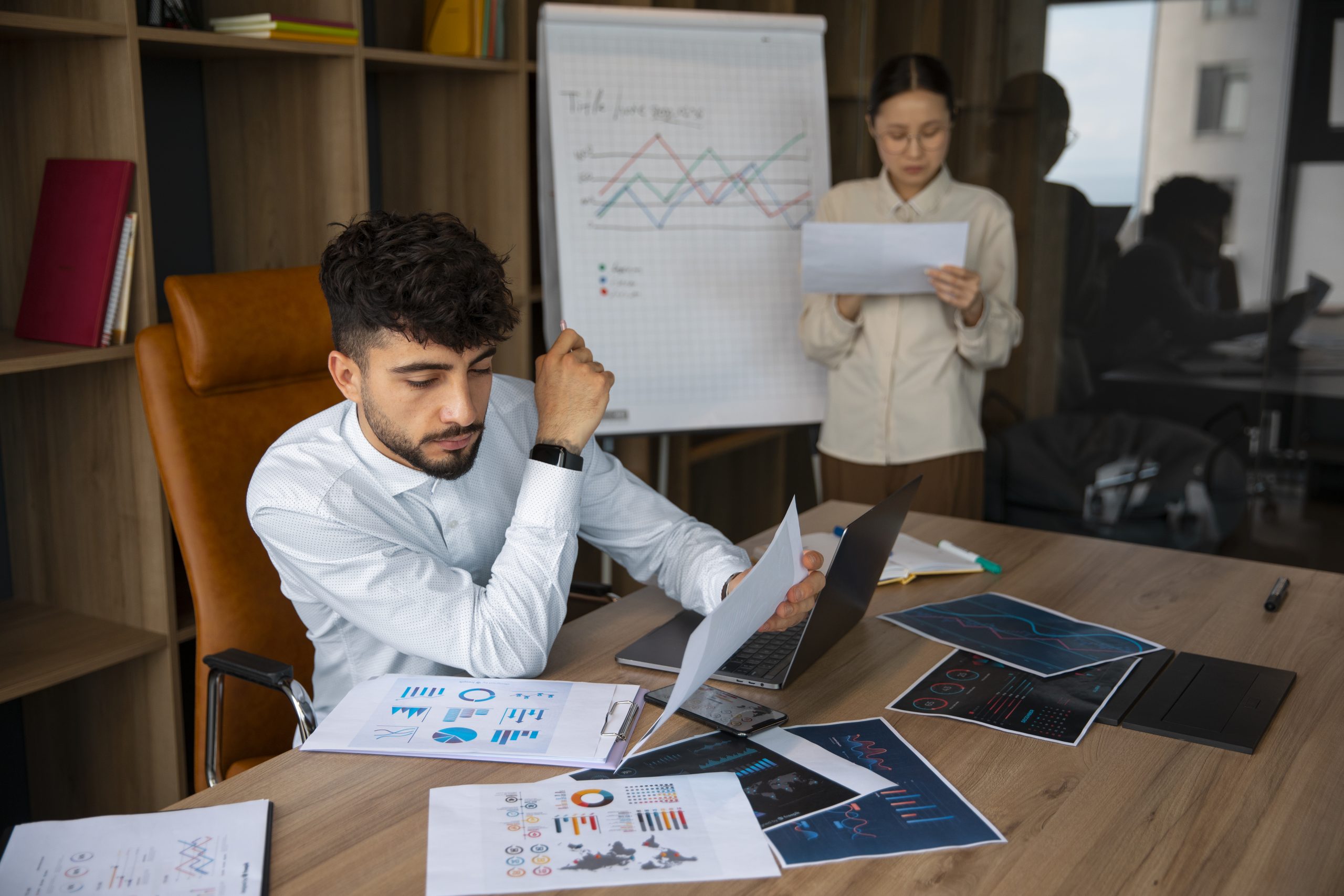 office-workers-using-finance-graphs